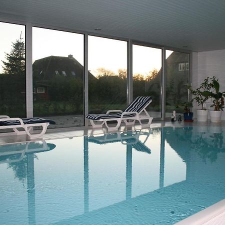 Ferienwohnungen Im Hotel Garni Zur Post Utersum Номер фото