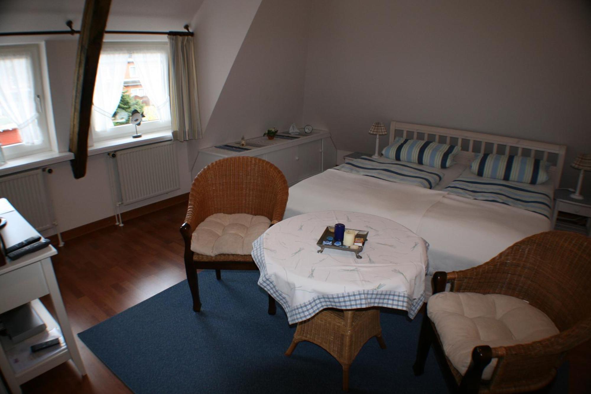 Ferienwohnungen Im Hotel Garni Zur Post Utersum Номер фото